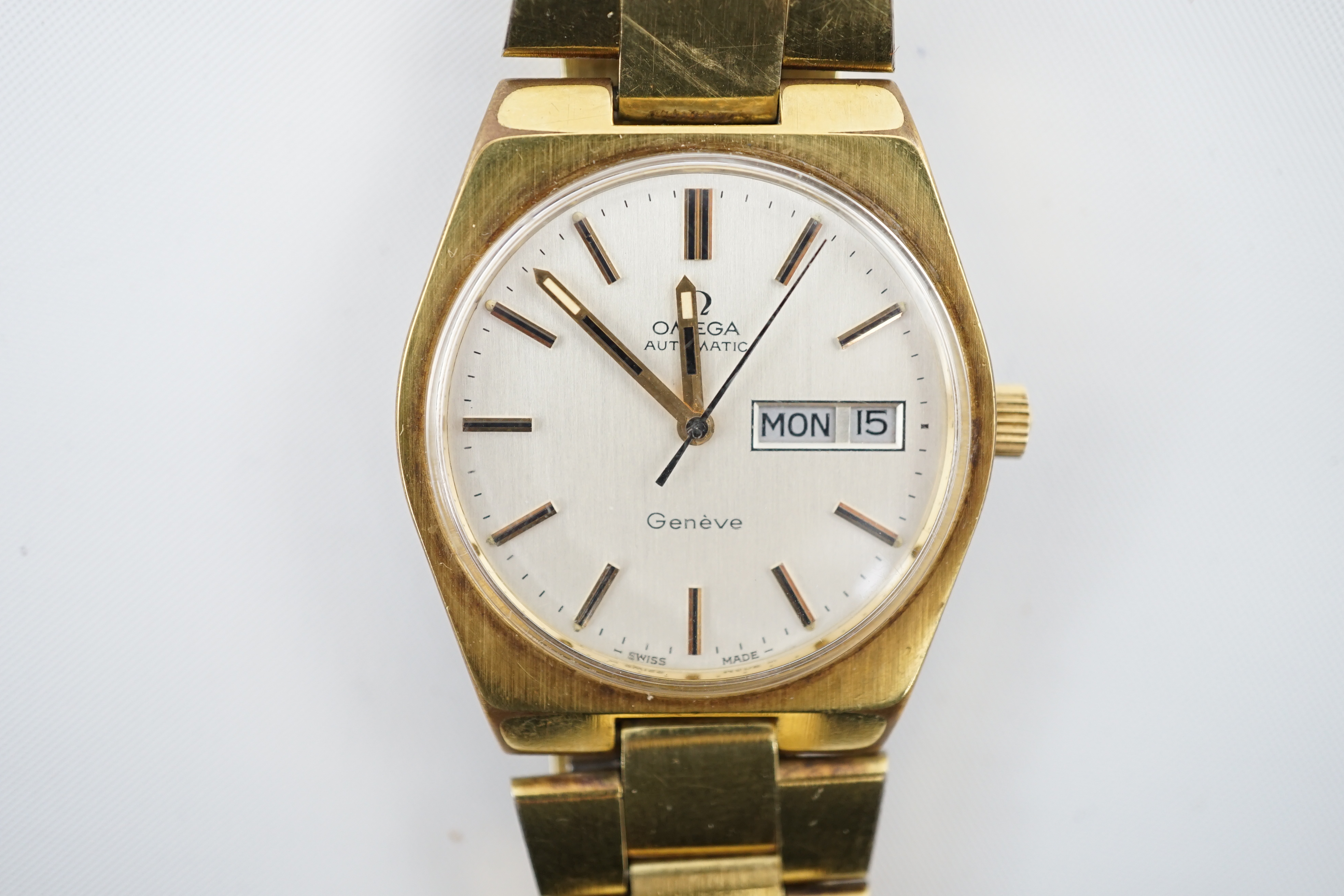 A gentleman's 1980's steel and gold plated Omega Day Date automatic wrist watch, on a steel and gold plated Omega bracelet